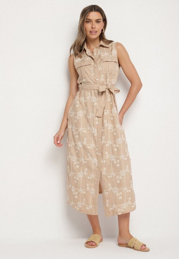 Born2be - Beżowa Sukienka Bez Rękawów o Koszulowym Kroju z Paskiem Zdobiona Haftem Fodarela. Okazja: na co dzień. Kolor: beżowy. Długość rękawa: bez rękawów. Wzór: haft, aplikacja. Sezon: lato. Typ sukienki: koszulowe. Styl: klasyczny, casual, elegancki