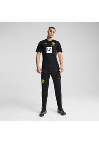 Puma - Męska koszulka treningowa Borussia Dortmund PUMA Black Faster Yellow. Kolor: żółty, wielokolorowy, czarny