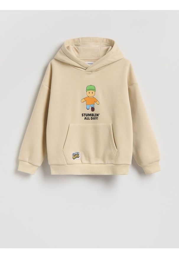 Reserved - Bluza z kapturem Stumble Guys - beżowy. Typ kołnierza: kaptur. Kolor: beżowy. Materiał: bawełna, dzianina