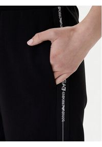 EA7 Emporio Armani Spodnie dresowe 7W000961 AF12501 UC001 Czarny Flared Fit. Kolor: czarny. Materiał: syntetyk #5