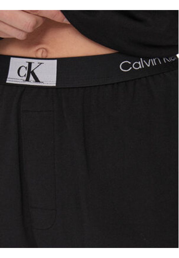 Calvin Klein Underwear Spodnie piżamowe 000QS7085E Czarny Relaxed Fit. Kolor: czarny. Materiał: bawełna