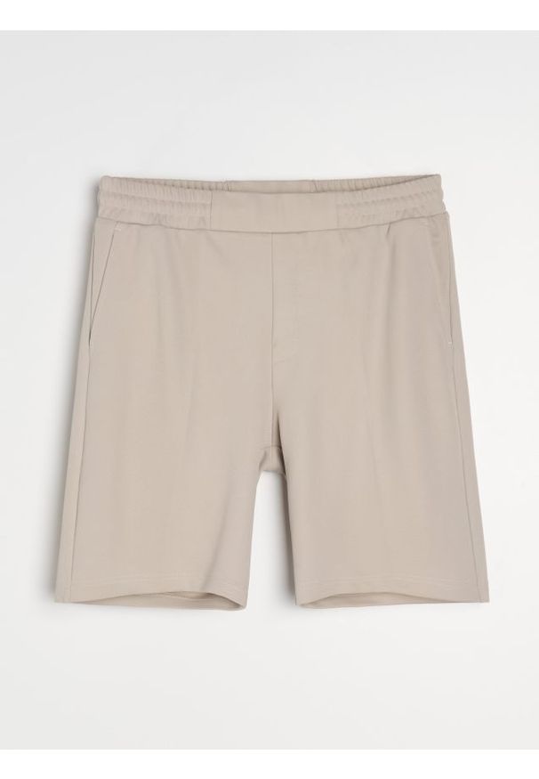 Sinsay - Szorty slim - beżowy. Kolor: beżowy
