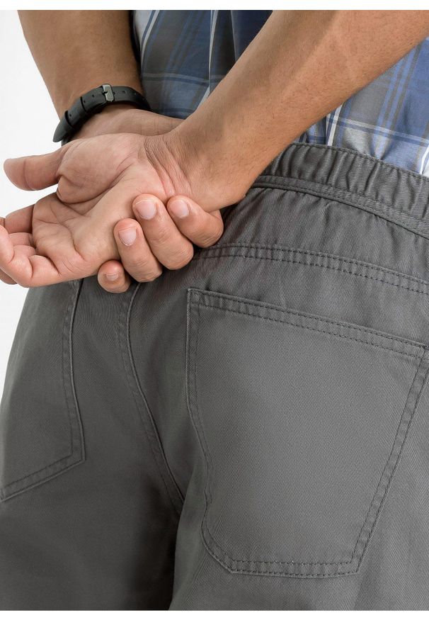 bonprix - Spodnie z gumką w talii regular fit, prosta nogawka (2 pary). Kolor: niebieski