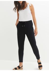 bonprix - Spodnie z dżerseju z elastycznej mieszanki bawełny. Kolor: czarny. Materiał: jersey, bawełna #1