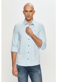 Calvin Klein - Koszula bawełniana. Okazja: na co dzień. Typ kołnierza: kołnierzyk klasyczny. Kolor: niebieski. Materiał: bawełna. Długość rękawa: długi rękaw. Długość: długie. Wzór: gładki. Styl: casual, klasyczny #5