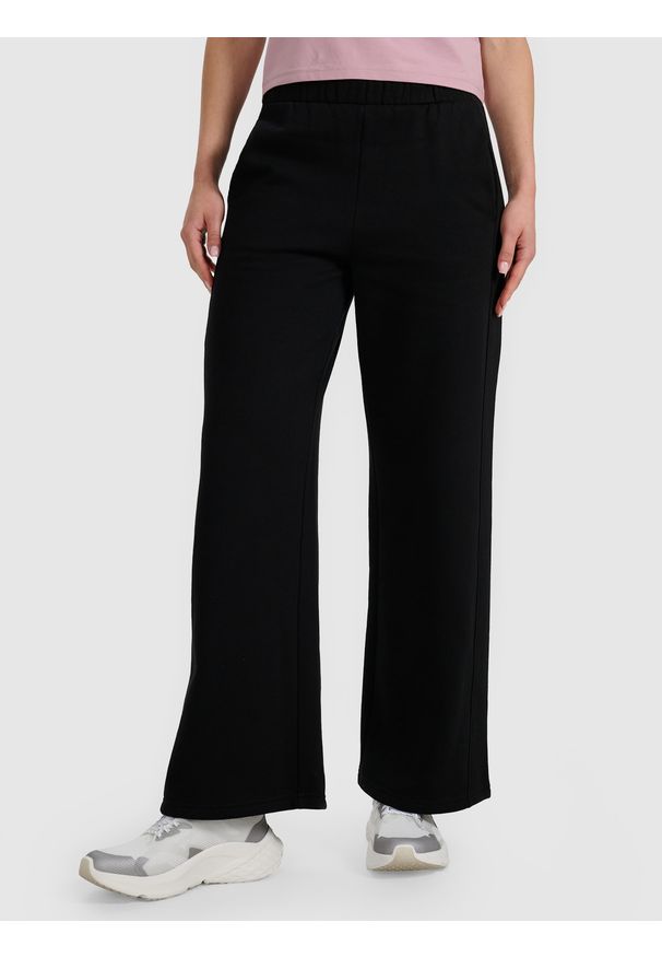 4f - 4F Spodnie dresowe z szerokimi nogawkami damskie - czarne XL. Stan: podwyższony. Kolor: czarny. Materiał: dresówka