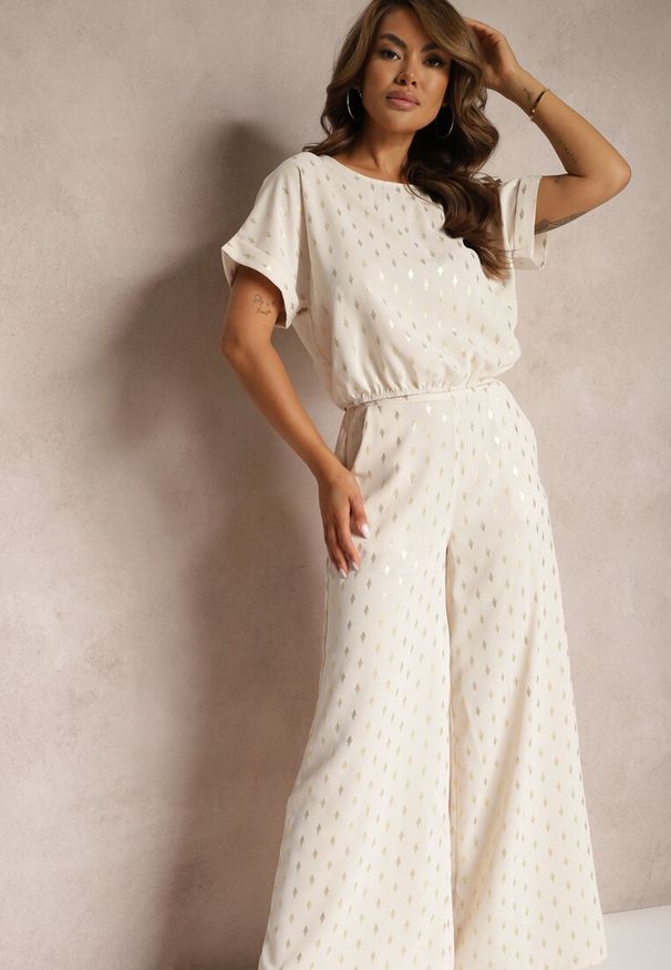 Renee - Beżowo-Złoty Casualowy Komplet Długie Spodnie i Bluzka Zakończona Gumką w Pasie Acrinna. Kolor: beżowy