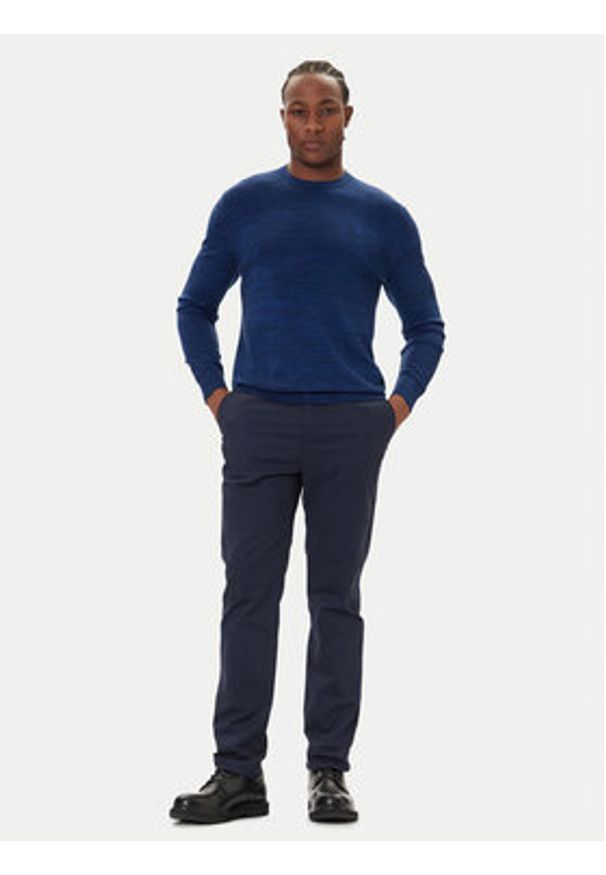 Calvin Klein Chinosy LV04LD613G Granatowy Slim Fit. Kolor: niebieski. Materiał: bawełna