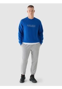 4f - 4F Bluza dresowa nierozpinana bez kaptura męska - niebieska XL. Okazja: na co dzień. Typ kołnierza: bez kaptura. Kolor: niebieski. Materiał: dresówka. Długość rękawa: raglanowy rękaw. Wzór: napisy, gładki, ze splotem. Styl: sportowy, klasyczny, casual