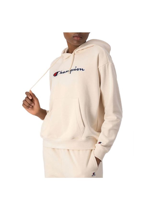 Bluza Champion Heavy Cotton Embroidered Hoodie 114919-YS015 - beżowa. Okazja: na co dzień. Typ kołnierza: kaptur. Kolor: beżowy. Materiał: materiał, poliester, bawełna. Długość rękawa: długi rękaw. Długość: długie. Wzór: aplikacja. Styl: klasyczny, casual