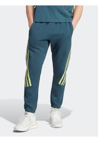 Adidas - Spodnie dresowe adidas. Kolor: turkusowy. Materiał: bawełna, dresówka #1