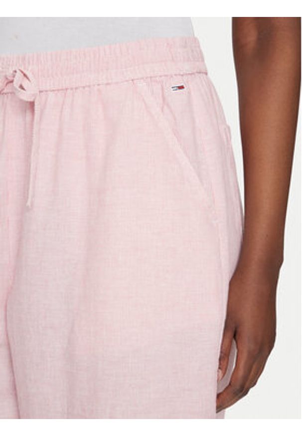 Tommy Jeans Spodnie materiałowe DW0DW20352 Różowy Regular Fit. Kolor: różowy. Materiał: bawełna