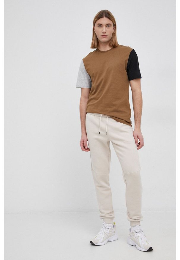 Jack & Jones - Spodnie. Kolor: beżowy. Materiał: dzianina