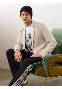 Sinsay - Czapka beanie z domieszką wełny - czarny. Kolor: czarny. Materiał: wełna