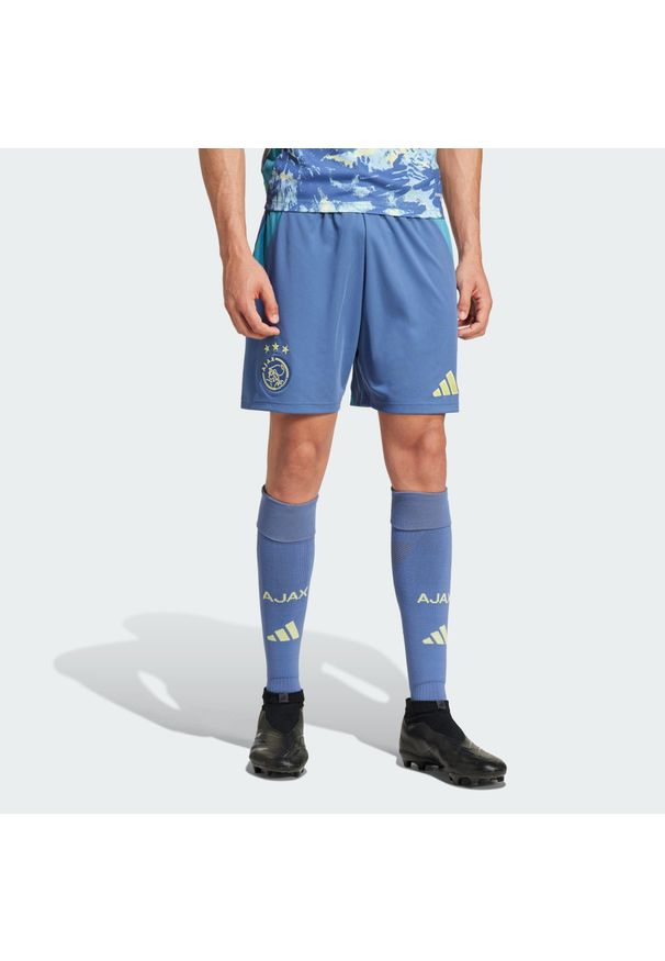 Adidas - Szorty Ajax Amsterdam 24/25 Away. Kolor: niebieski. Materiał: materiał. Sport: piłka nożna