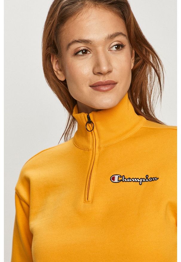 Champion - Bluzka bawełniana 113188. Okazja: na co dzień. Kolor: żółty. Materiał: bawełna. Długość rękawa: długi rękaw. Długość: krótkie. Styl: casual
