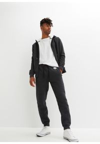 bonprix - Spodnie sportowe ocieplane, na polarowej podszewce. Kolor: czarny. Materiał: polar. Styl: sportowy #2