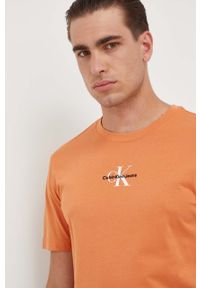 Calvin Klein Jeans t-shirt bawełniany kolor pomarańczowy z nadrukiem. Kolor: pomarańczowy. Materiał: bawełna. Wzór: nadruk. Styl: klasyczny #3