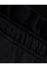 AGOLDE - Czarne spodnie dresowe. Kolor: czarny. Materiał: dresówka
