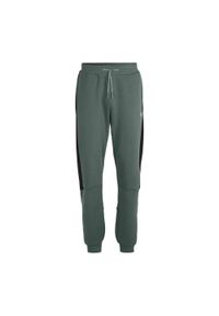 Fila - Spodnie męskie FILA Rouvroy. Kolor: zielony. Materiał: dresówka