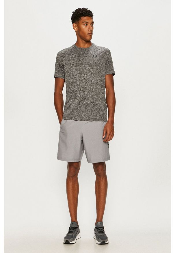 Under Armour - T-shirt. Okazja: na co dzień. Kolor: czarny. Materiał: materiał. Styl: casual