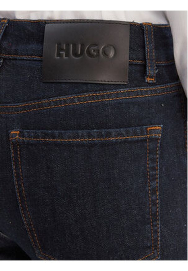 Hugo - HUGO Jeansy Geflare_3 50553195 Granatowy Flare Fit. Kolor: niebieski