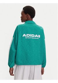 Adidas - adidas Kurtka przejściowa Tiro x Common Goal Coaches JL9204 Turkusowy Loose Fit. Kolor: turkusowy. Materiał: syntetyk