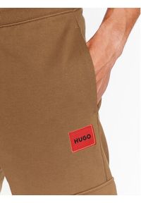 Hugo Spodnie dresowe Dwellrom 50479164 Brązowy Relaxed Fit. Kolor: brązowy. Materiał: dresówka, bawełna