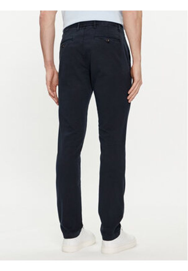 TOMMY HILFIGER - Tommy Hilfiger Chinosy Bleecker MW0MW33910 Granatowy Slim Fit. Kolor: niebieski. Materiał: bawełna