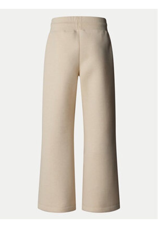 The North Face Spodnie dresowe NF0A8C25 Beżowy Wide Leg. Kolor: beżowy. Materiał: bawełna
