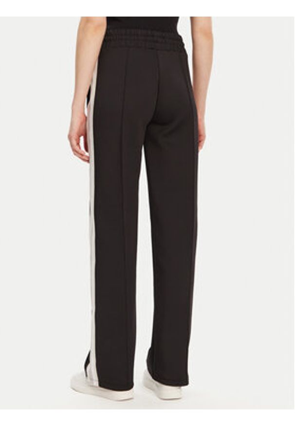 Guess Spodnie dresowe V5GB12 KCRU2 Czarny Regular Fit. Kolor: czarny. Materiał: syntetyk