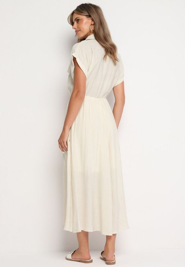 Born2be - Beżowa Wiskozowa Rozkloszowana Sukienka z Gumką w Talii Ozdobiona Guzikami Lemvia. Okazja: na spotkanie biznesowe. Kolor: beżowy. Materiał: wiskoza. Wzór: aplikacja. Typ sukienki: rozkloszowane, sportowe. Styl: elegancki, klasyczny, sportowy, biznesowy