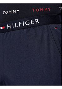 TOMMY HILFIGER - Tommy Hilfiger Spodnie dresowe UM0UM01186 Granatowy Regular Fit. Kolor: niebieski. Materiał: bawełna, dresówka