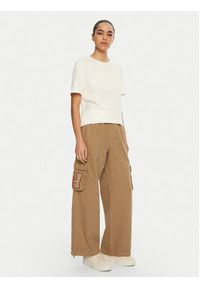 Tommy Jeans Spodnie materiałowe DW0DW20531 Beżowy Relaxed Fit. Kolor: beżowy. Materiał: bawełna #4