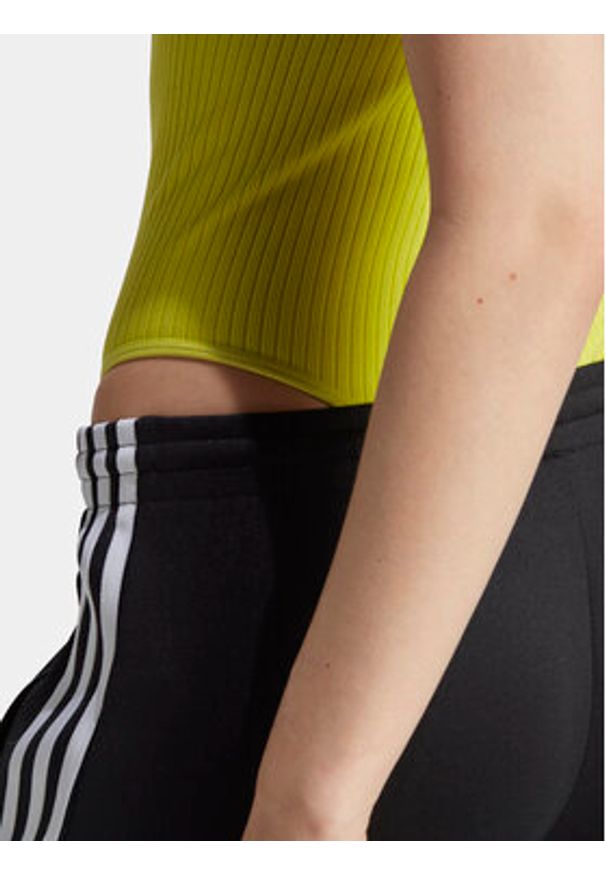 Adidas - adidas Spodnie dresowe adicolor SST IK6600 Czarny Slim Fit. Kolor: czarny. Materiał: bawełna