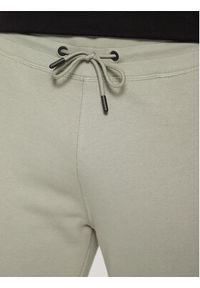 Guess Spodnie dresowe Z2YB22 K9V31 Zielony Regular Fit. Kolor: zielony. Materiał: bawełna