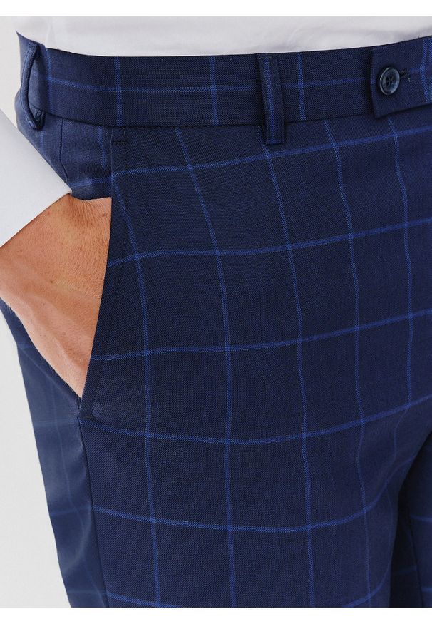 Pako Lorente - PAKO LORENTE – Granatowe spodnie garniturowe w niebieską kratkę. Kolor: niebieski. Materiał: poliester, lycra, wełna. Wzór: kratka