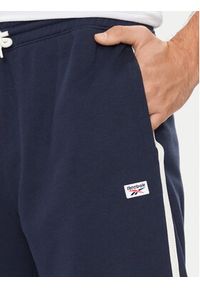 Reebok Spodnie dresowe Court Sport 100075479 Granatowy Relaxed Fit. Kolor: niebieski. Materiał: bawełna #4