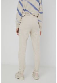 Tom Tailor spodnie damskie kolor beżowy gładkie. Stan: podwyższony. Kolor: beżowy. Materiał: dzianina, poliester. Wzór: gładki