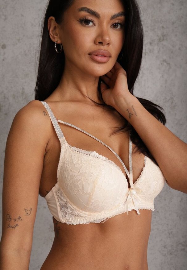 Renee - Jasnobeżowy Koronkowy Biustonosz Ozdobiony Kokardą Falzedia. Kolor: beżowy. Materiał: koronka. Rodzaj stanika: odpinane ramiączka. Wzór: aplikacja