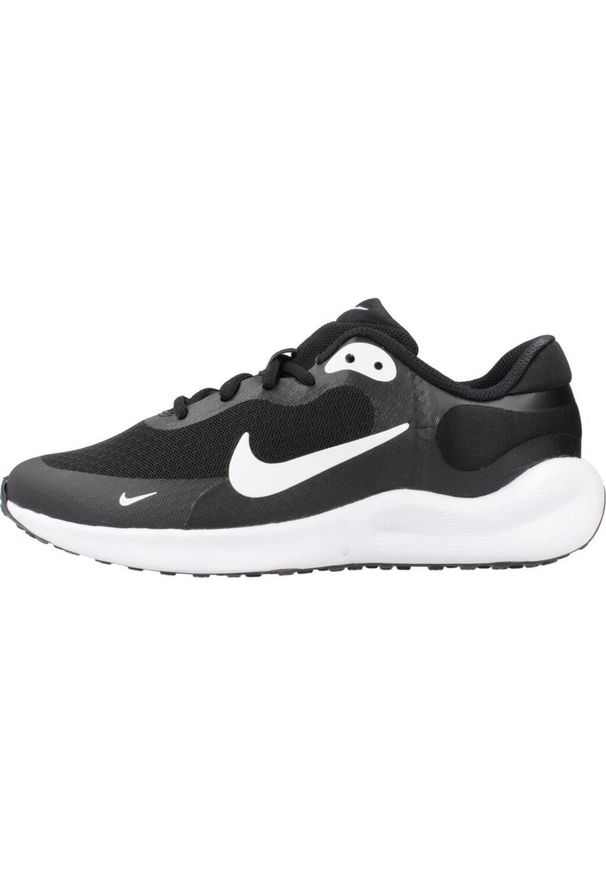 Buty do biegania dla dzieci Nike Revolution 7. Zapięcie: sznurówki. Kolor: czarny, biały, wielokolorowy. Materiał: syntetyk, tkanina, materiał. Szerokość cholewki: normalna. Model: Nike Revolution. Sport: bieganie