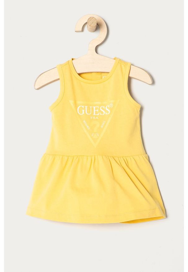 Guess - Sukienka dziecięca 62-96 cm. Kolor: żółty. Materiał: bawełna, dzianina. Wzór: nadruk. Typ sukienki: rozkloszowane