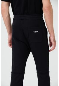 Balmain - BALMAIN Czarne spodnie dresowe RIbbed Flock Sweatpants. Kolor: czarny. Materiał: dresówka #4