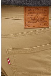 Levi's® - Levi's spodnie 511 męskie kolor beżowy dopasowane. Okazja: na spotkanie biznesowe. Kolor: beżowy. Materiał: tkanina, materiał. Wzór: gładki. Styl: biznesowy #3