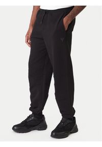 Guess Spodnie dresowe Z6RB03 K9YI1 Beżowy Regular Fit. Kolor: beżowy. Materiał: bawełna #1