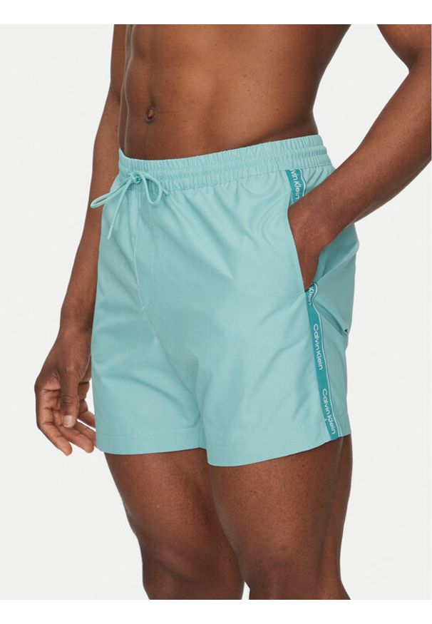 Calvin Klein Swimwear Szorty kąpielowe KM0KM01109 Błękitny Regular Fit. Kolor: niebieski. Materiał: syntetyk