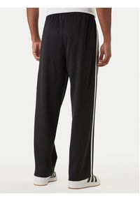 Adidas - adidas Spodnie dresowe adicolor KE3501 Czarny Loose Fit. Kolor: czarny. Materiał: bawełna #2