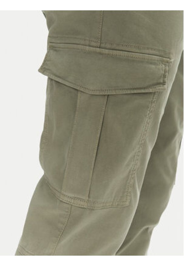 Tommy Jeans Spodnie materiałowe Austin DM0DM20281 Zielony Regular Fit. Kolor: zielony. Materiał: bawełna