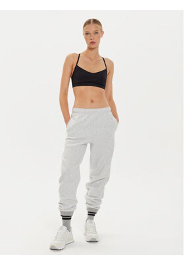 Champion Spodnie dresowe 116243 Szary Regular Fit. Kolor: szary. Materiał: bawełna