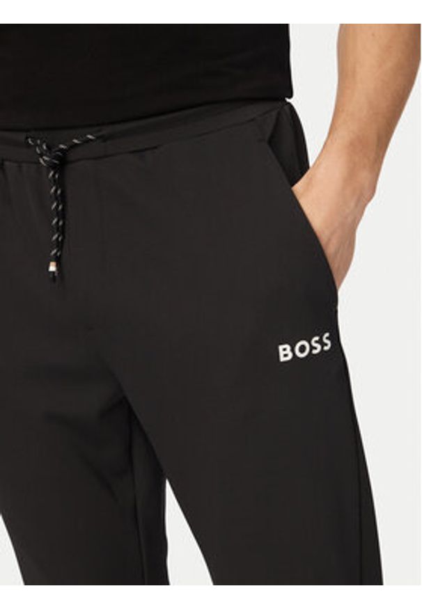 BOSS Spodnie dresowe Toc Spin 50554379 Czarny Regular Fit. Kolor: czarny. Materiał: syntetyk